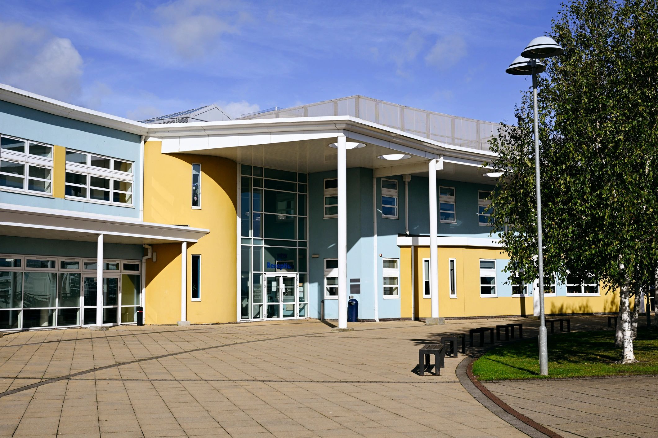 Modern commercial building exterior representing a development project